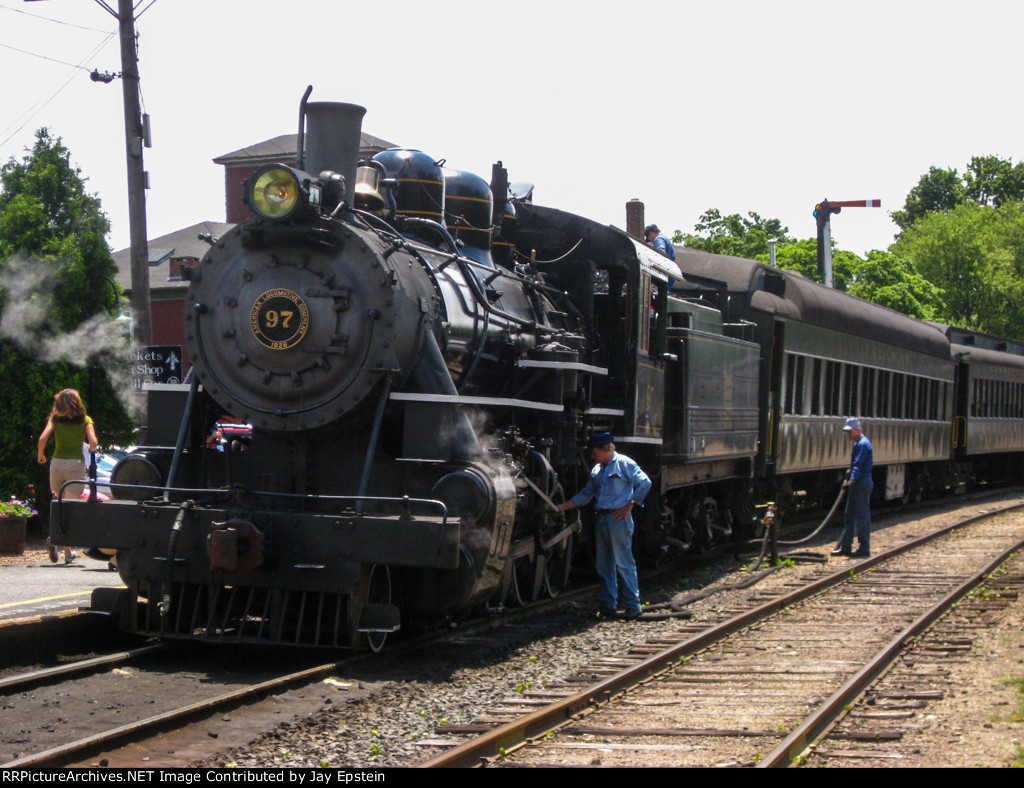 Crew-members attend to #97 before its next run 